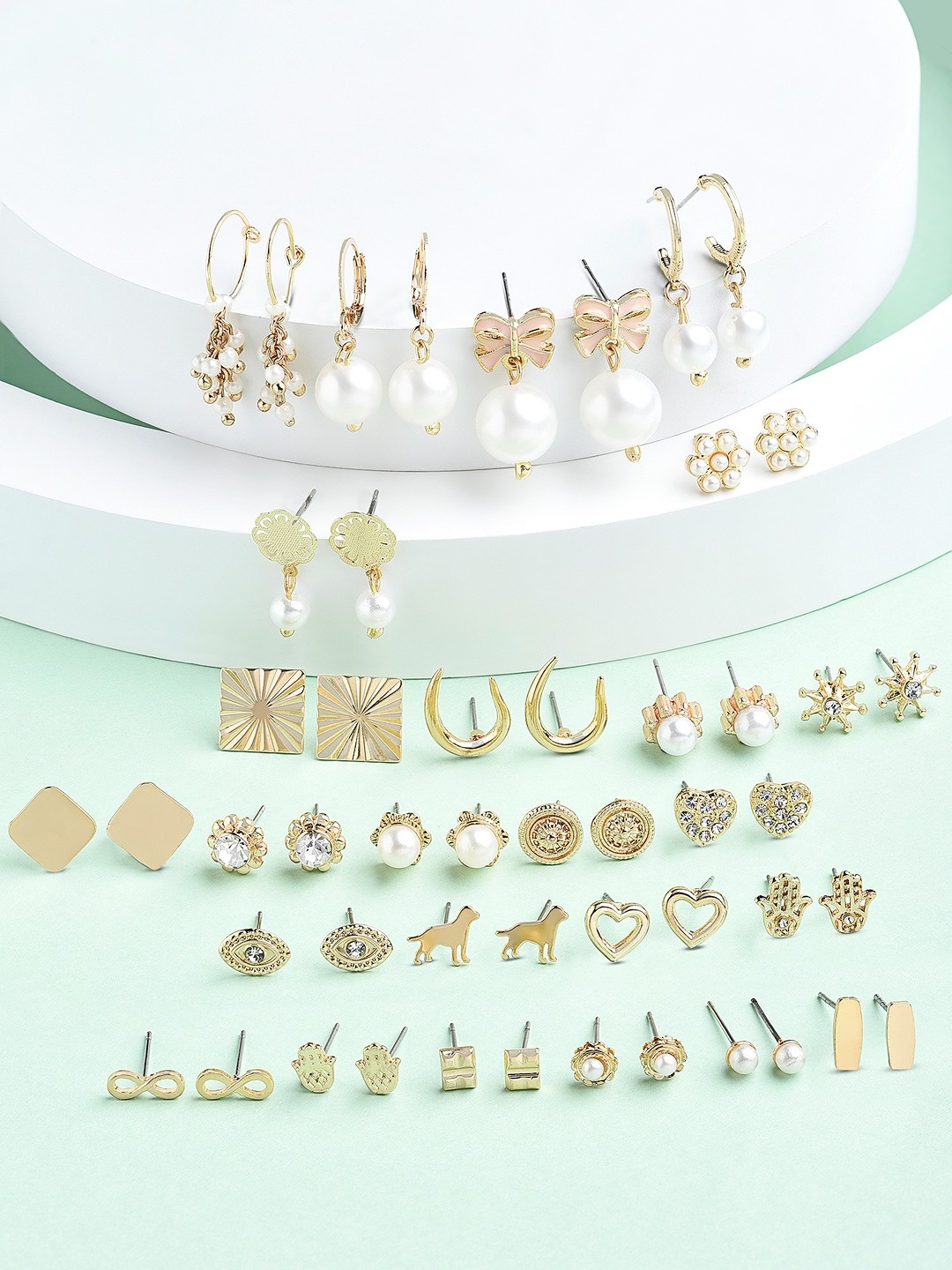 

Zaveri Pearls Woman Set of 25 Contemporary Studs Earrings, Gold