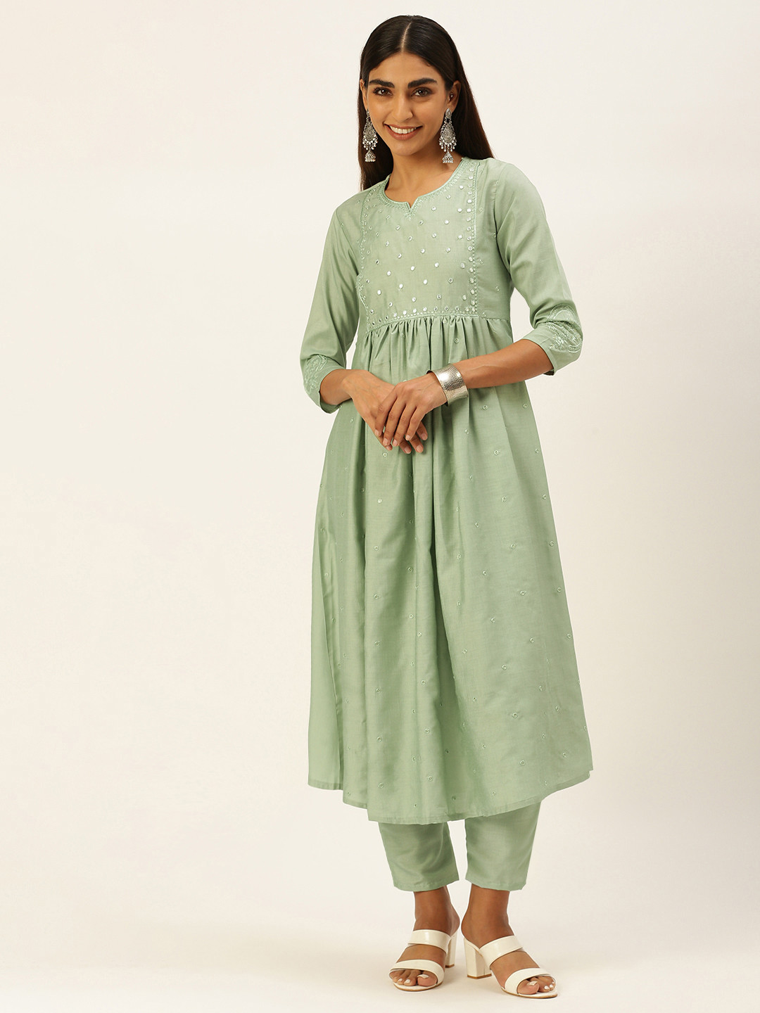 

SWAGG INDIA Women Sea Green Ethnic Motifs Embroidered Pleated Thread Work Kurta with Trousers