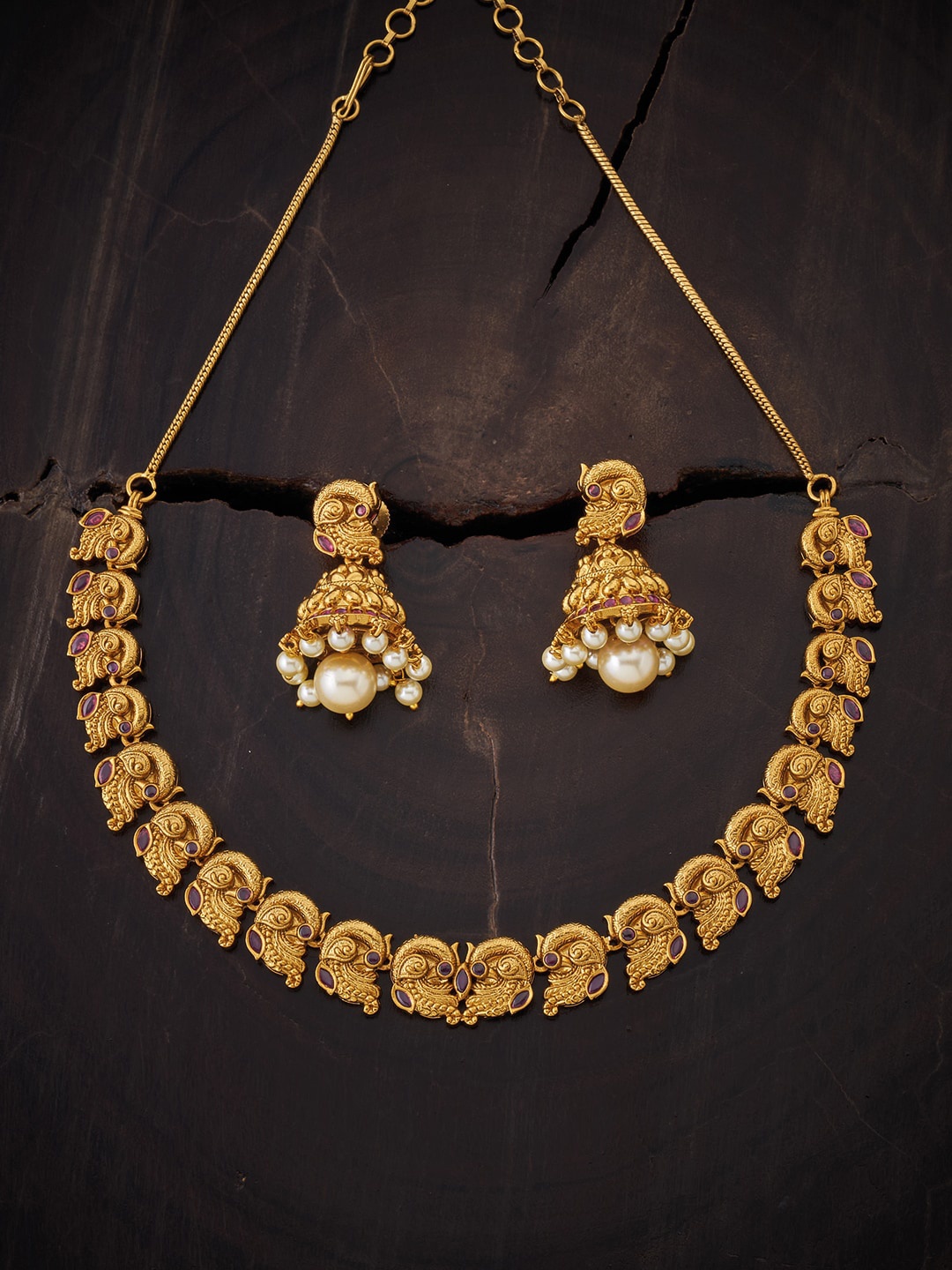 

Kushal's Fashion Jewellery Women Gold-Plated Ruby Studded & Pearl Beaded Jewellery Set