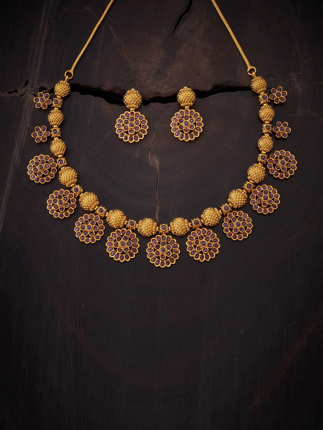 

Kushal's Fashion Jewellery Women Gold-Toned & Red Stone Studded Jewellery Set