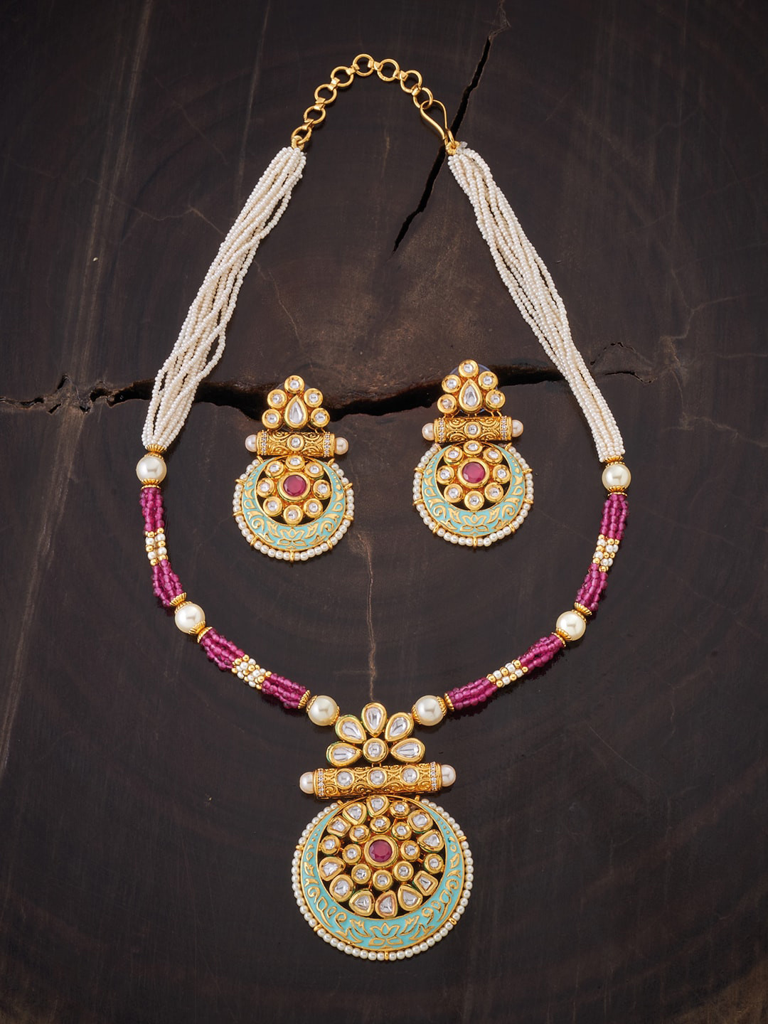 

Kushal's Fashion Jewellery Women Gold-Toned & White Kundan Studded & Beaded Jewellery Set