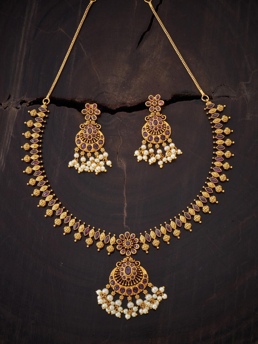 

Kushal's Fashion Jewellery Gold-Toned & Ruby Red Stone Studded Jewellery Set