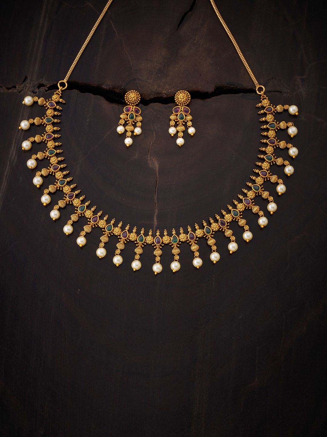 

Kushal's Fashion Jewellery Gold-Toned & Red Stones-Studded Embellished Jewellery Set