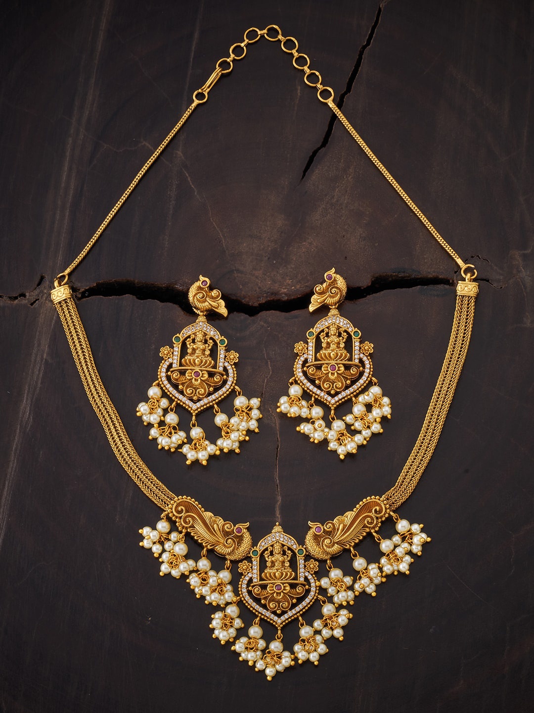 

Kushal's Fashion Jewellery Gold-Toned & Red Stone Studded & Beaded Jewellery Set