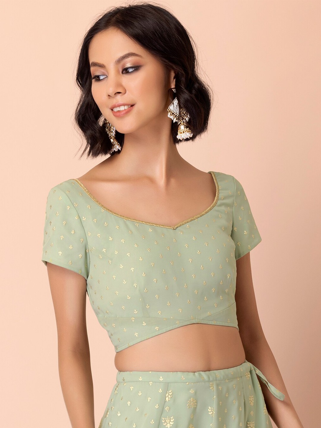 

INDYA Women Green Foil Cut Out Blouse
