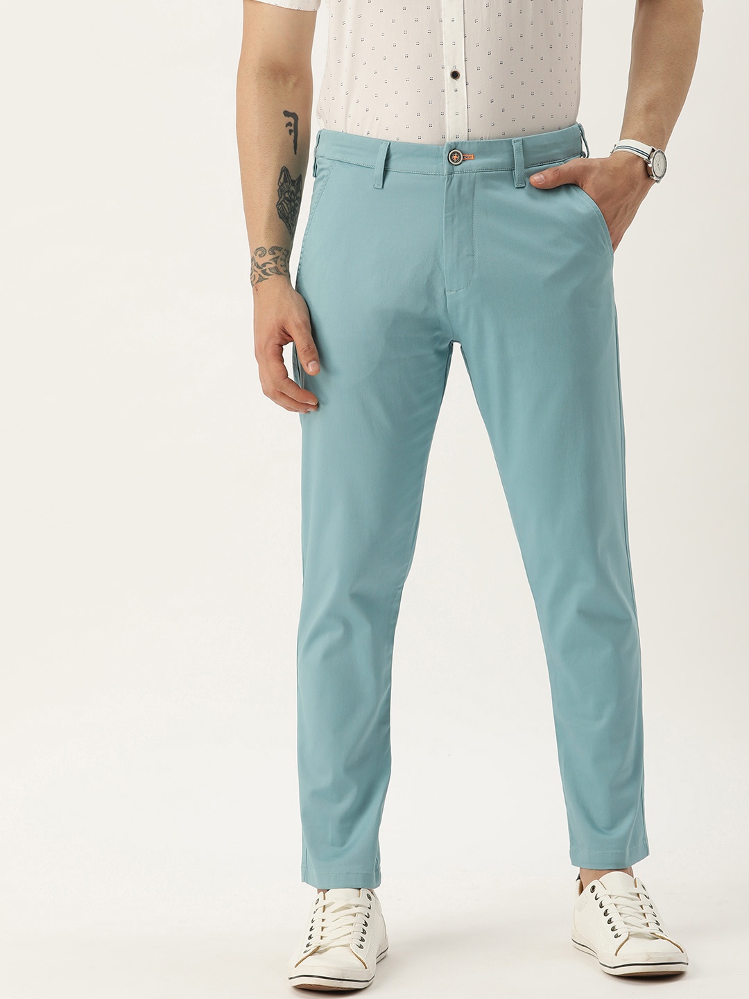 

Peter England Casuals Men Solid Carrot Tapered Fit Trousers, Turquoise blue