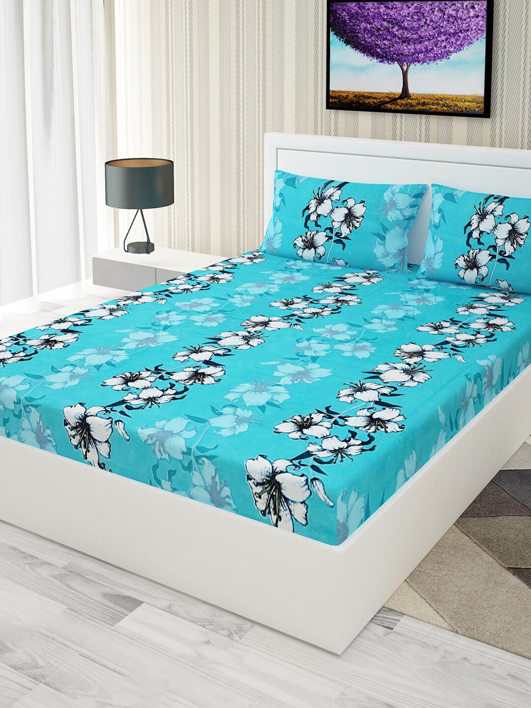 

Urban Magic Blue & White Floral Printed 120 TC Queen Bedsheet with 2 Pillow Covers