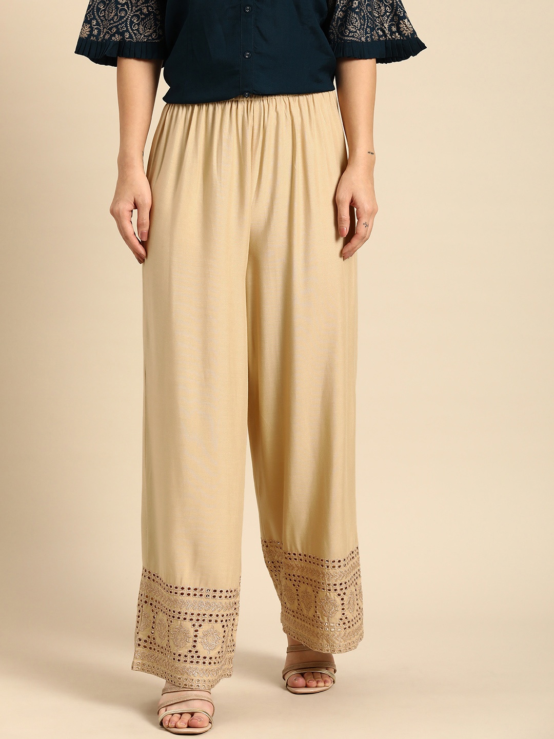 

Sangria Women Beige Ethnic Motifs Embroidered Palazzos