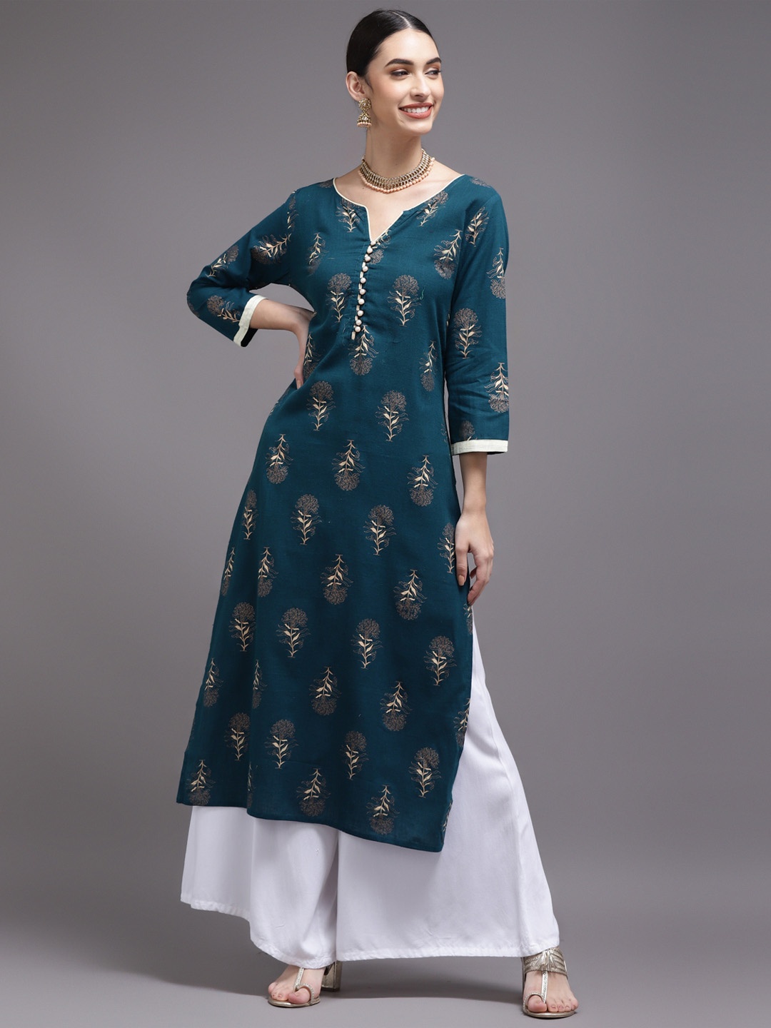 

KALINI Women Teal Floral Printed Thread Work Cotton Kurta