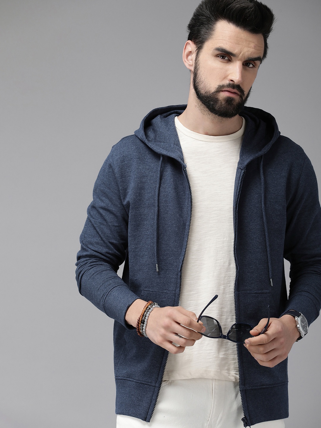 

Roadster Men Blue Solid Hooded Sweatshirt