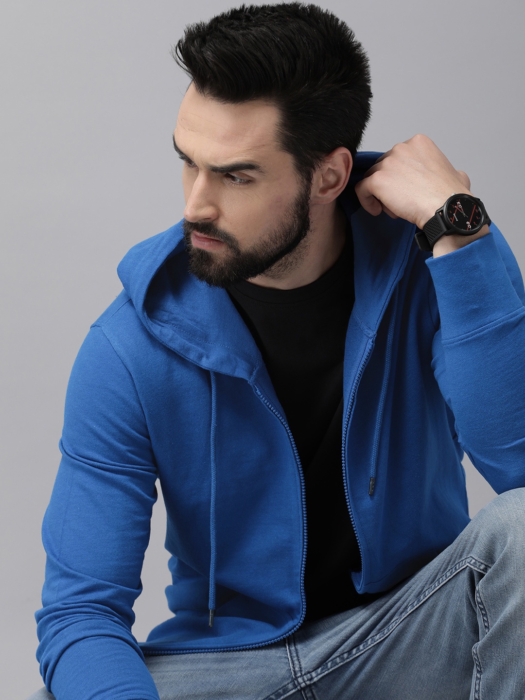 

Roadster Men Blue Solid Hooded Sweatshirt
