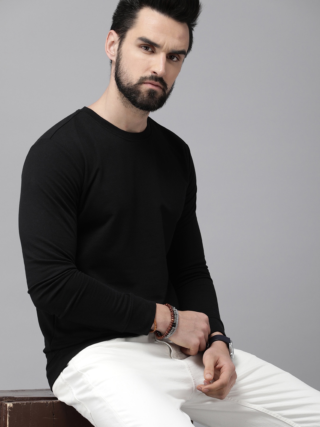 

Roadster Men Black Solid Sweatshirt