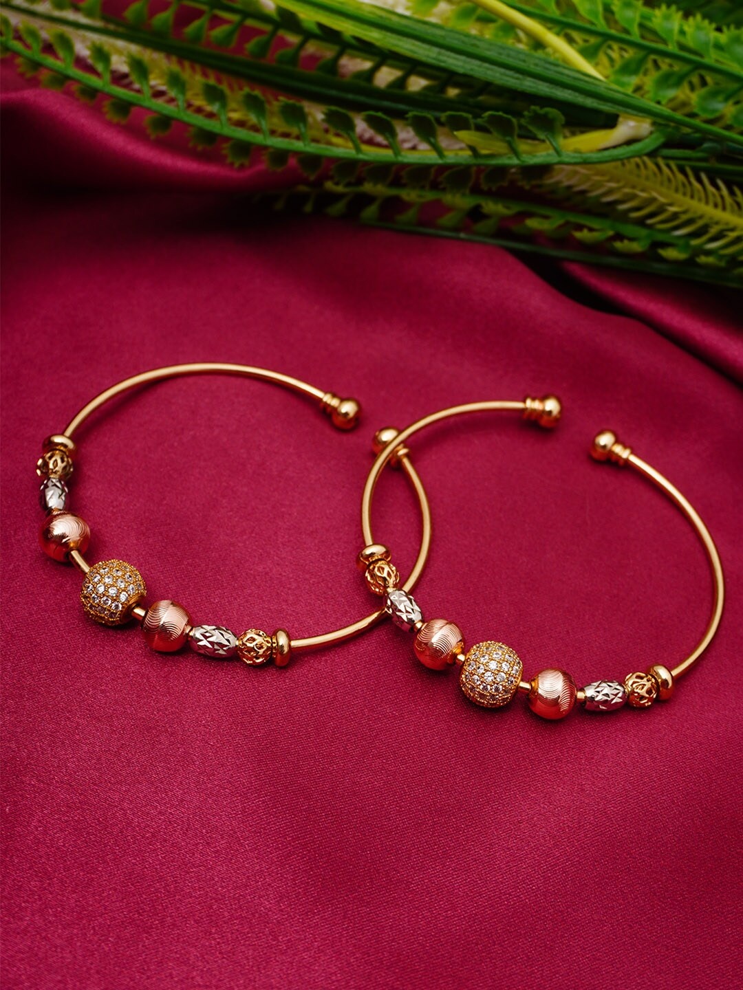 

Urmika Women Set Of 2 Gold-Toned & White Bangle-Style Bracelet