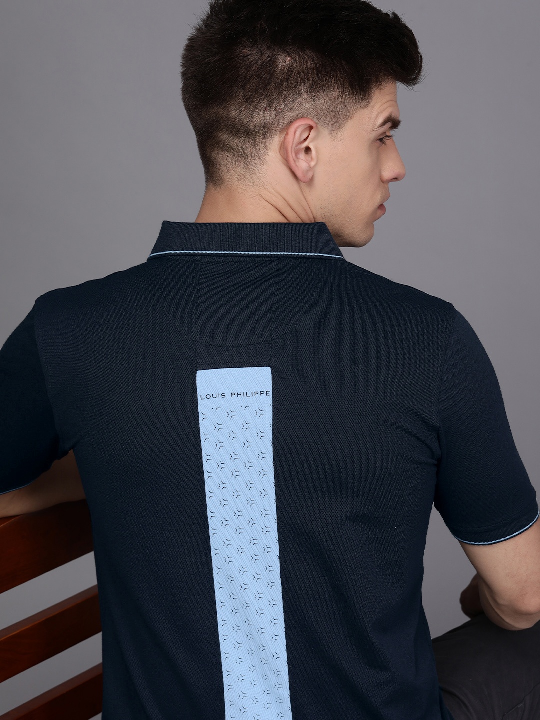 

Louis Philippe Men Navy Blue Typography Printed Polo Collar T-shirt