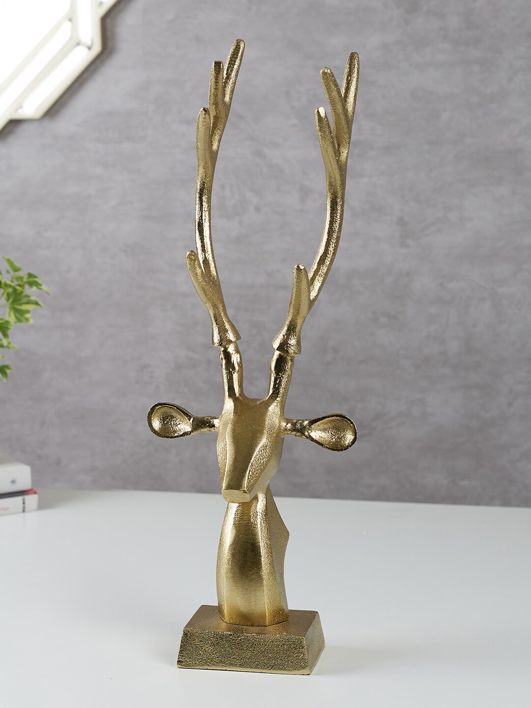 

HomeTown Gold-Toned Textured Reindeer Figurine Metal Showpiece