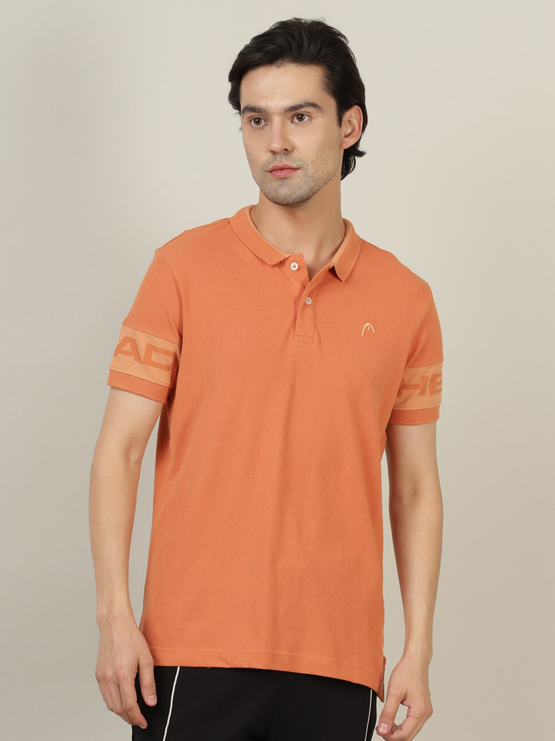 

Head Men Orange Solid Polo Collar T-shirt