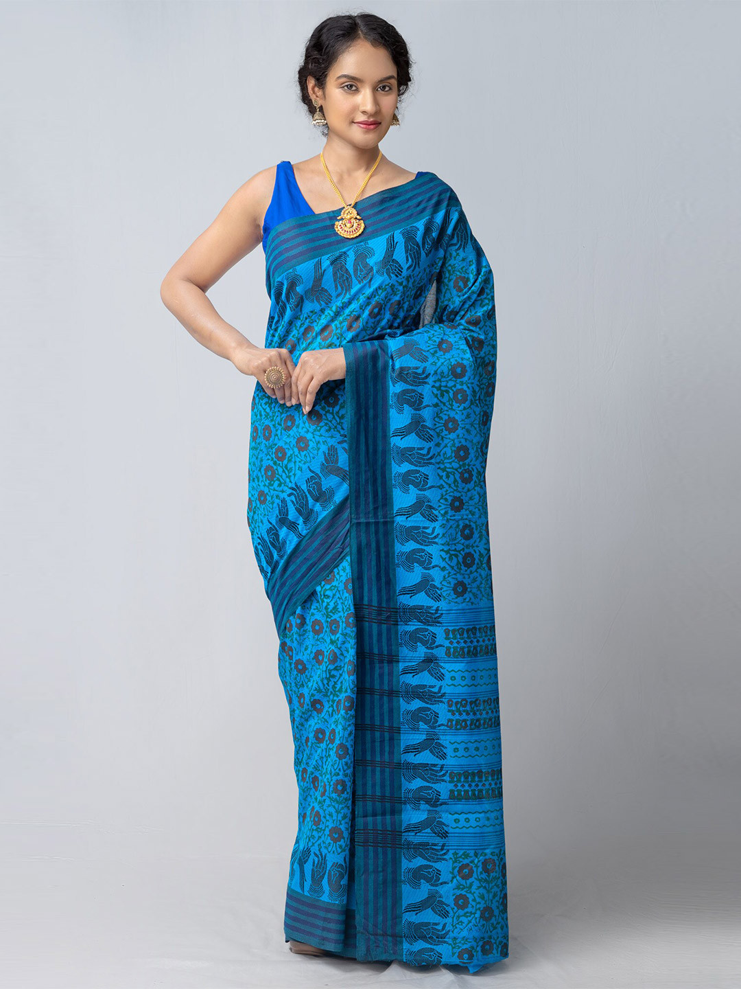 

Unnati Silks Blue & Brown Floral Printed Saree