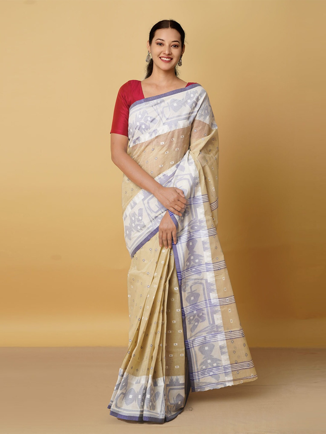 

Unnati Silks Cream-Coloured & Blue Woven Design Zari Pure Cotton Taant Saree