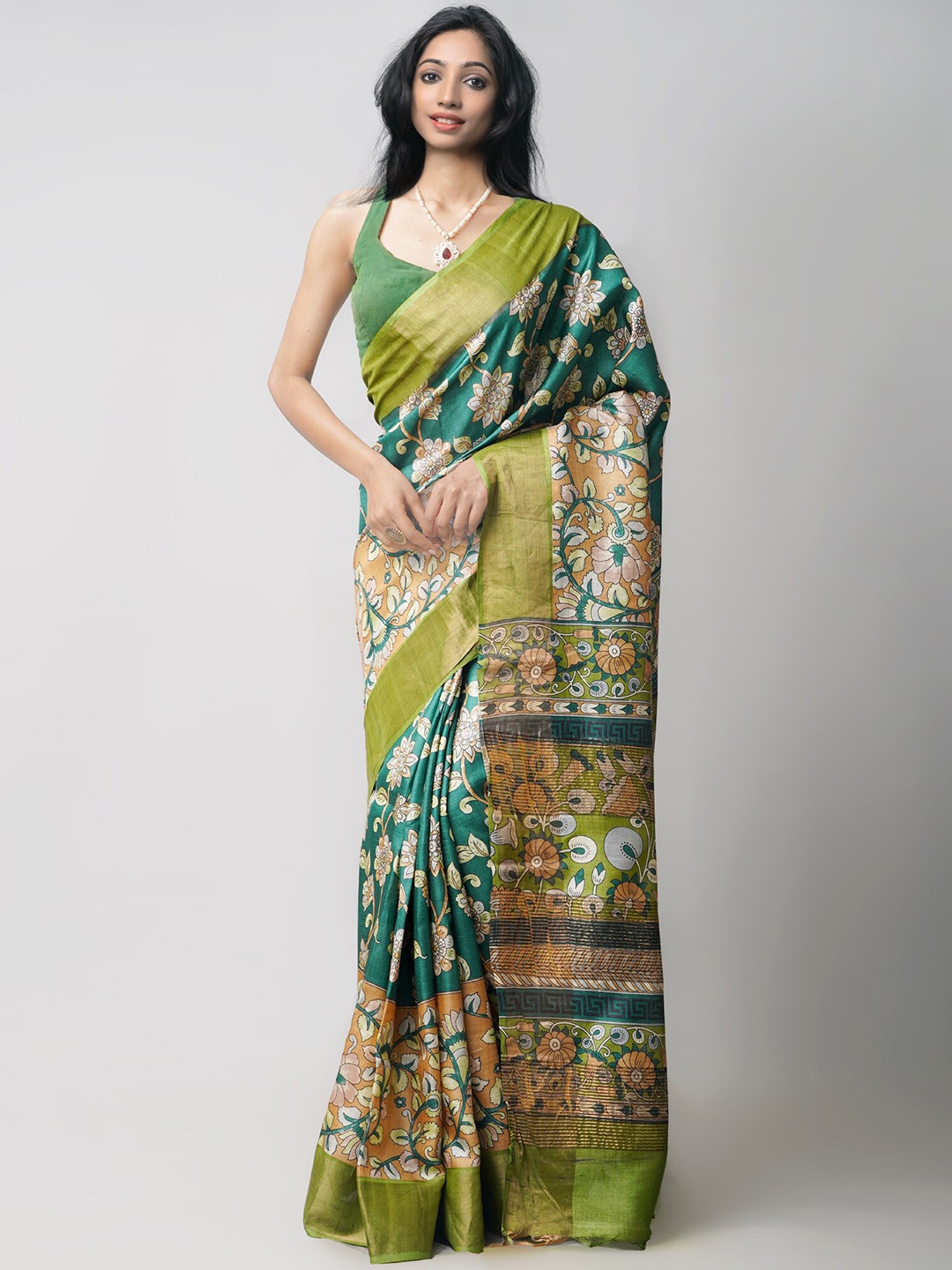 

Unnati Silks Green & White Floral Zari Pure Silk Jamdani Saree