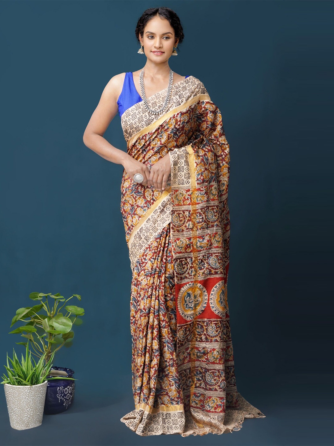 

Unnati Silks Brown & Yellow Kalamkari Pure Silk Block Print Saree