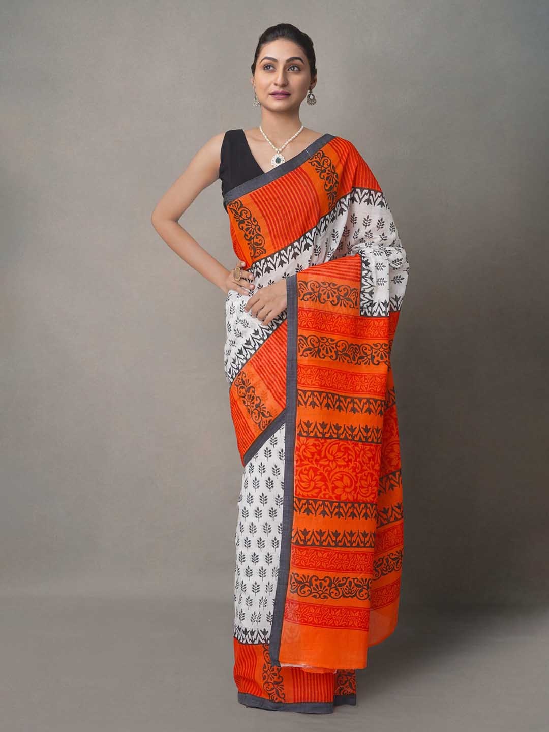

Unnati Silks White & Red Floral Pure Cotton Jamdani Saree