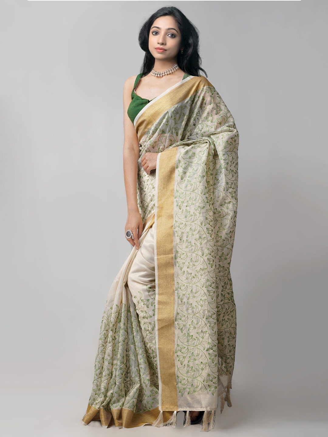 

Unnati Silks Cream-Coloured & Green Floral Zari Tissue Banarasi Saree