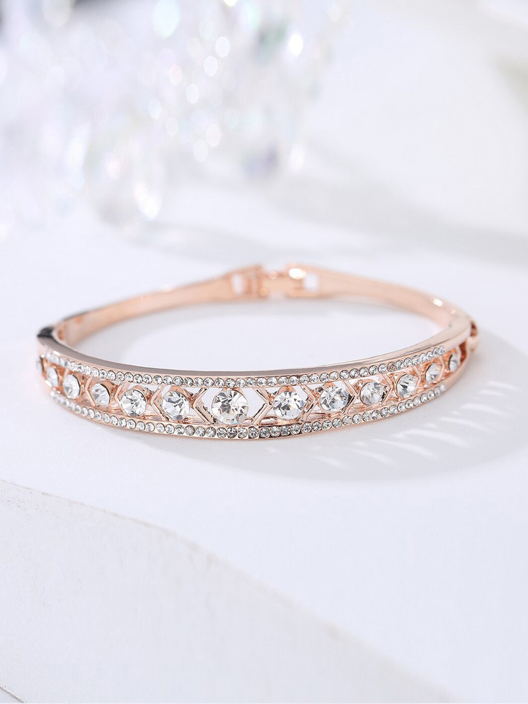 

Designs By Jewels Galaxy Women Rose Gold & White Brass American Diamond Rose Gold-Plated Bangle-Style Bracelet