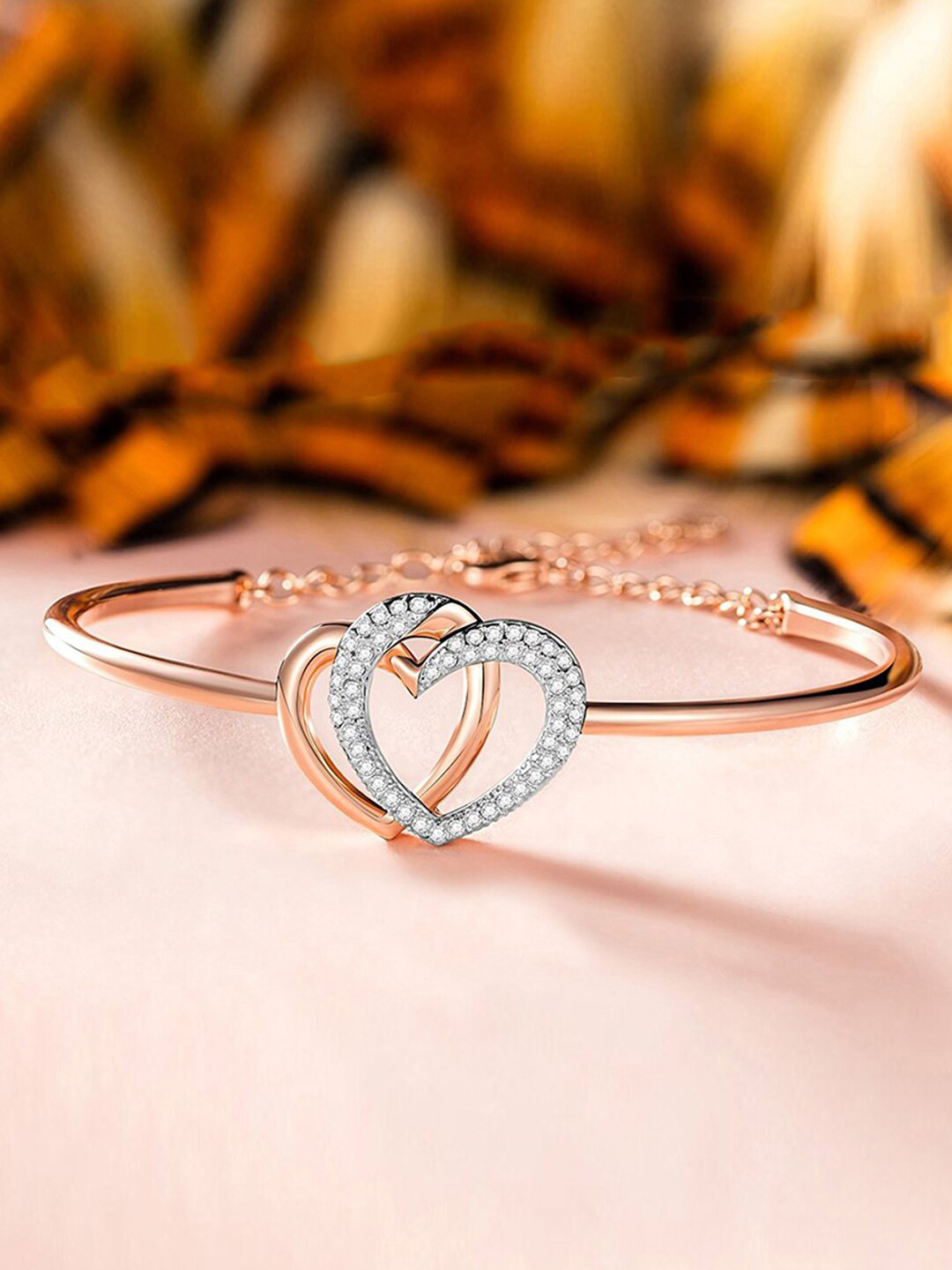 

Designs By Jewels Galaxy Women Rose Gold & White Brass American Diamond Rose Gold-Plated Bangle-Style Bracelet