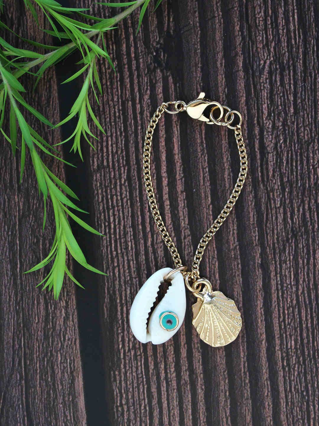

Runway Ritual Blue & Gold-Toned Boho Shell Charm
