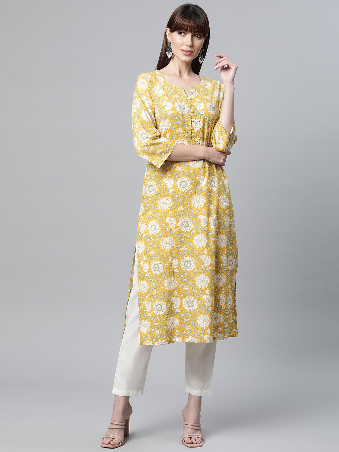 

Readiprint Women Mustard Yellow & Off White Floral Printed Mirror Work Kurta