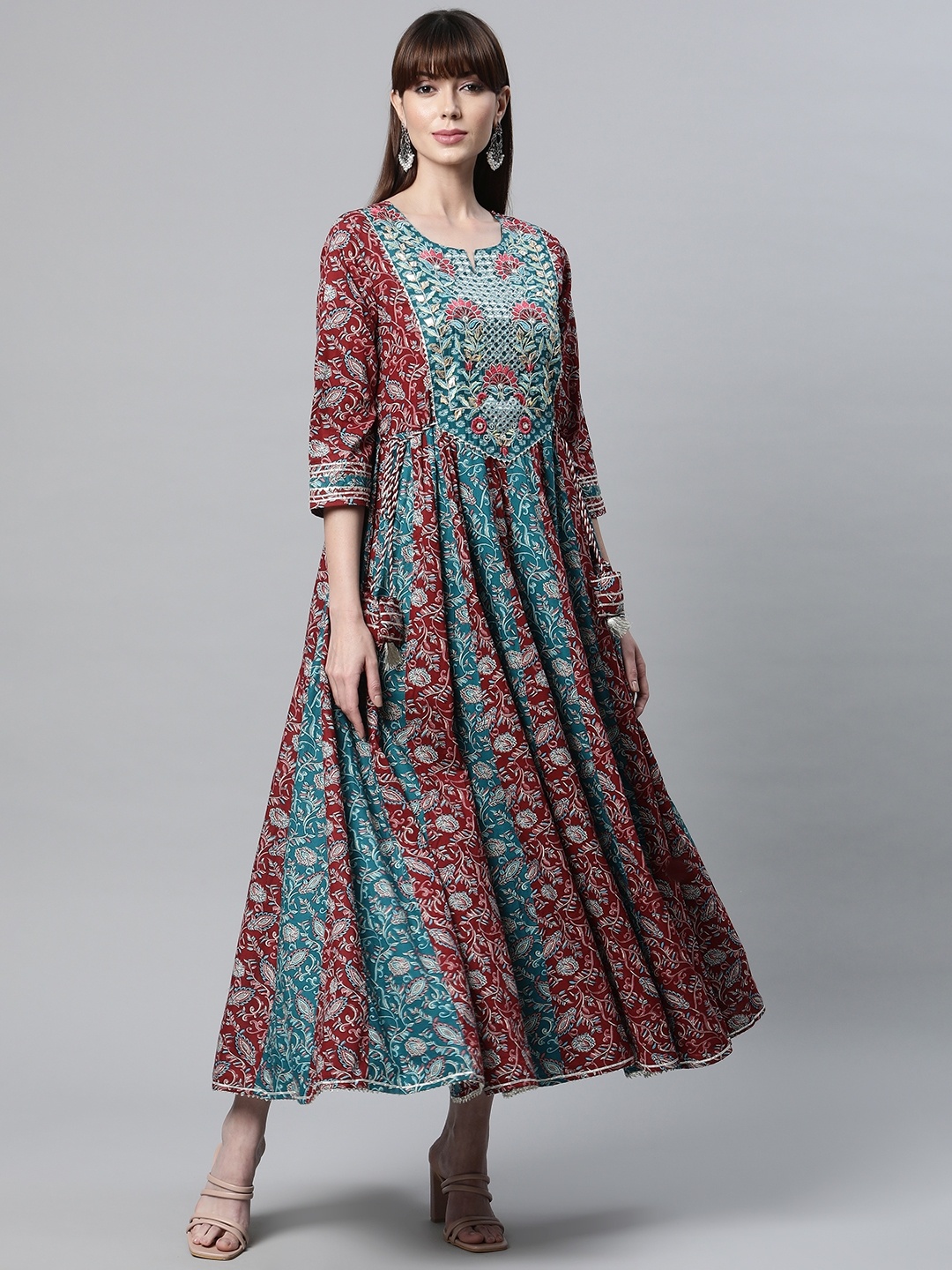 

Readiprint Fashions Women Teal & Maroon Floral Printed Thread Work Floral Anarkali Kurta