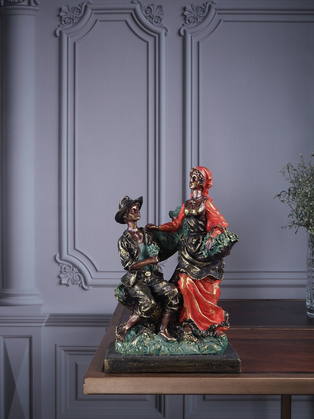 

THE WHITE INK DECOR Unisex Green & Orange Polyresin Figurine Showpieces