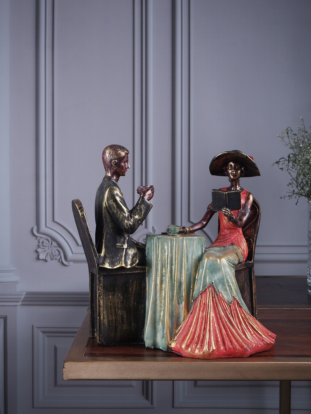 

THE WHITE INK DECOR Multi-Coloured Couple Figurine Showpiece