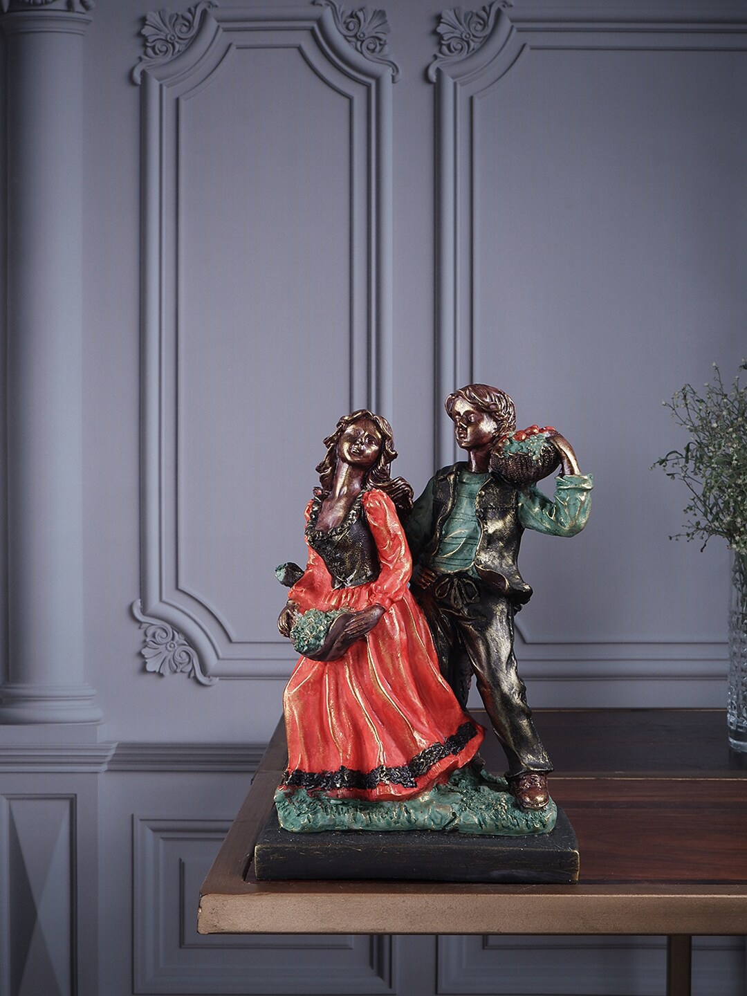 

THE WHITE INK DECOR Couple Figurine Showpiece, Orange