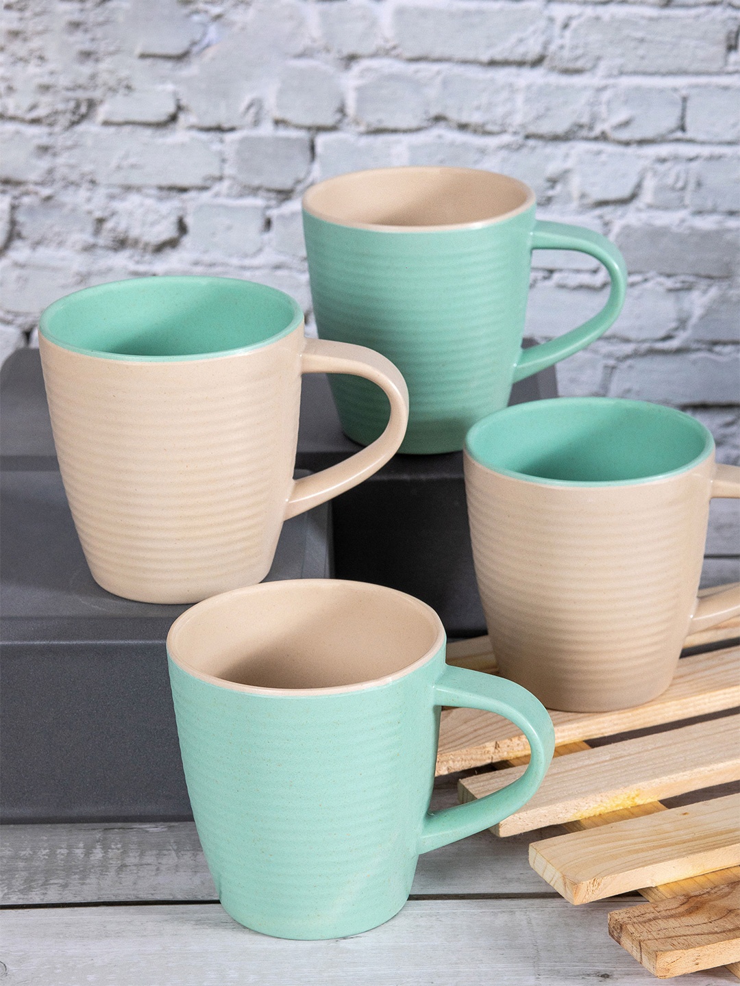 

Stehlen Set of 4 Peach-Coloured & Blue Blue Blue Textured Melamine Matte Mugs
