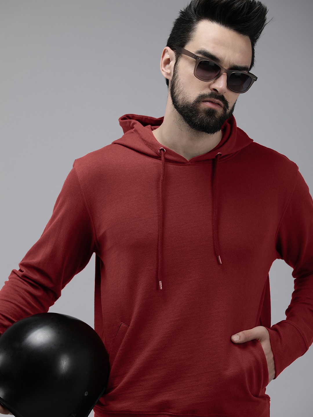 

Roadster Men Burgundy Solid Hooded Sweatshirt