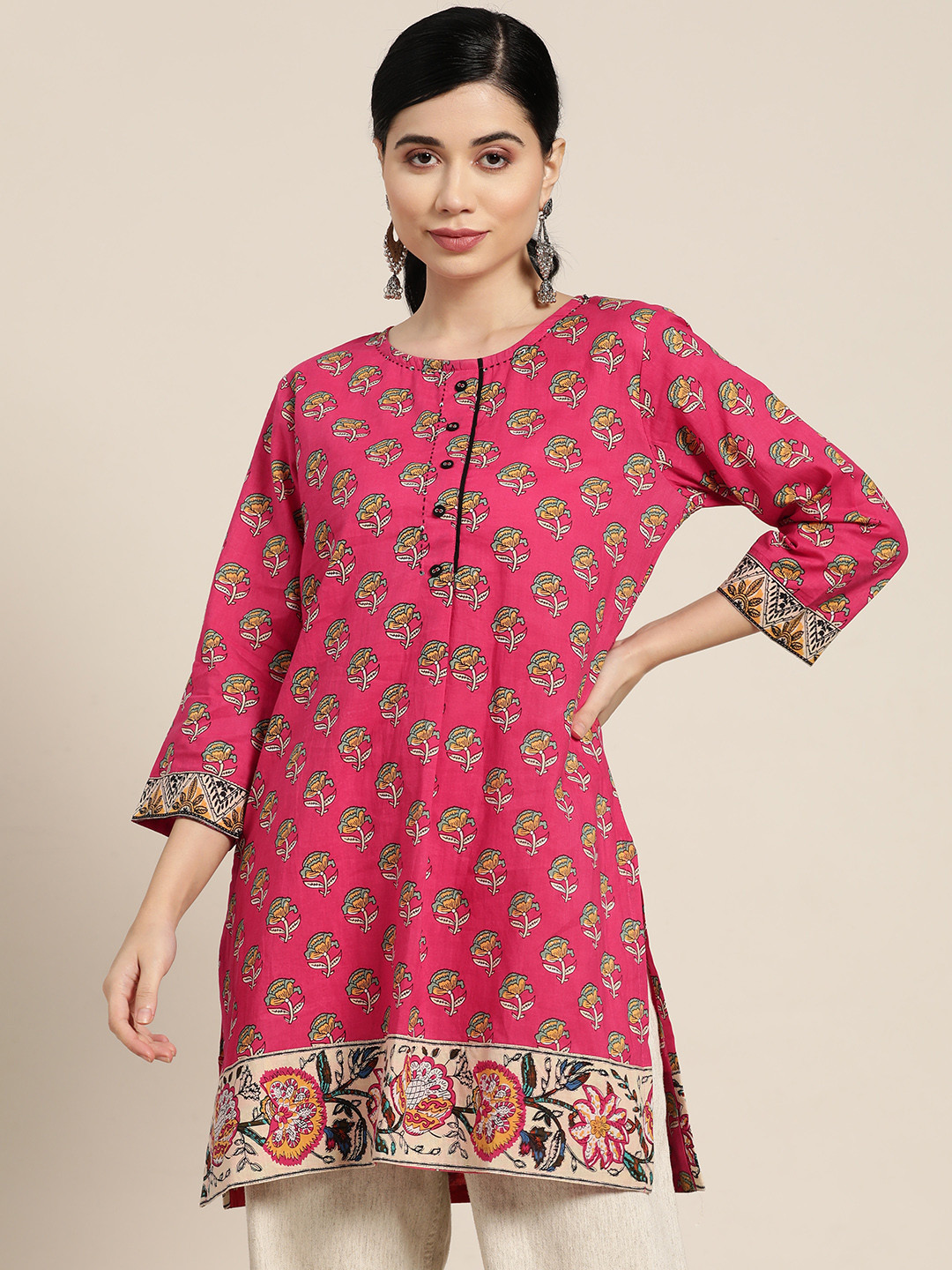 

Rain & Rainbow Fuchsia & Sea Green Floral Printed Sequinned Pure Cotton Kurti