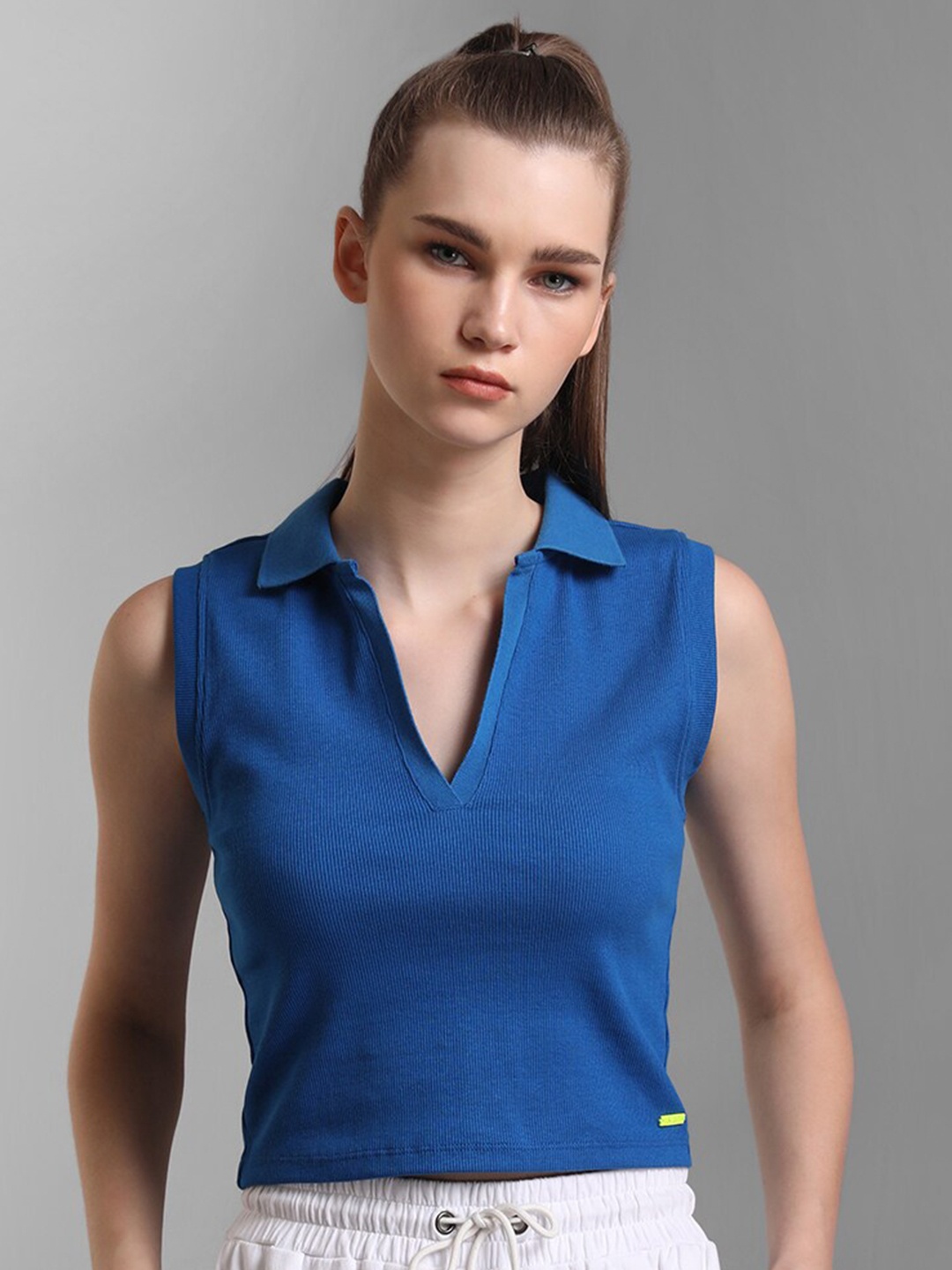 

Kazo Women Blue Solid Polo Collar T-shirt