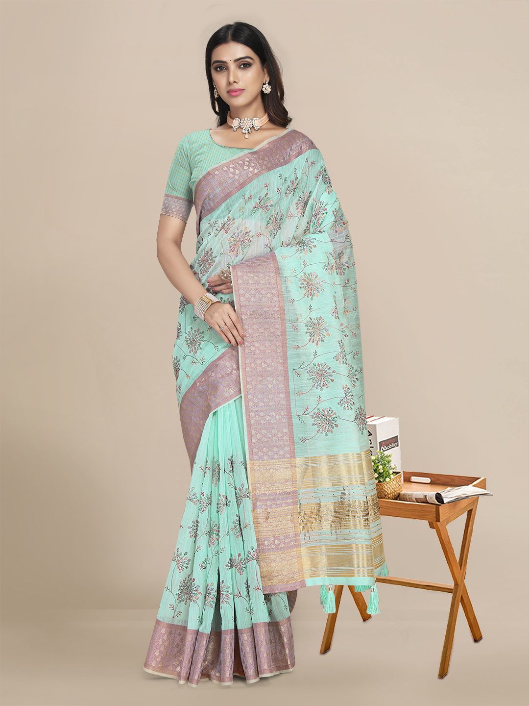 

Mitera Turquoise Blue & Gold-Toned Ethnic Motifs Zari Pochampally Saree