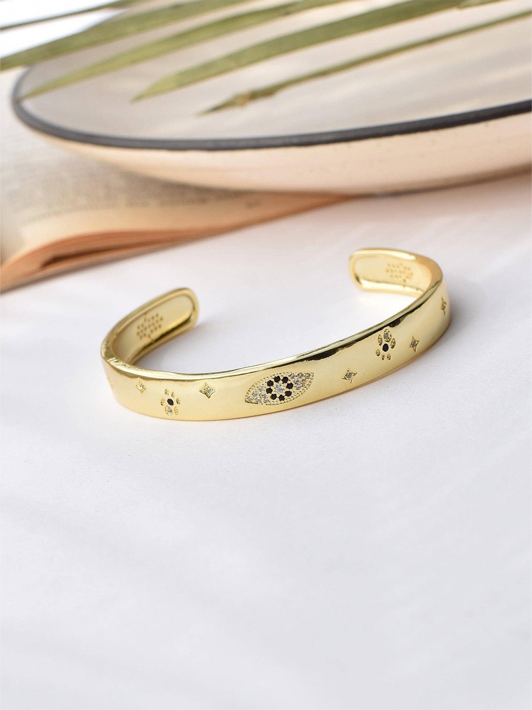 

Klissaa Women Gold-Toned & White Brass Gold-Plated Bangle-Style Bracelet