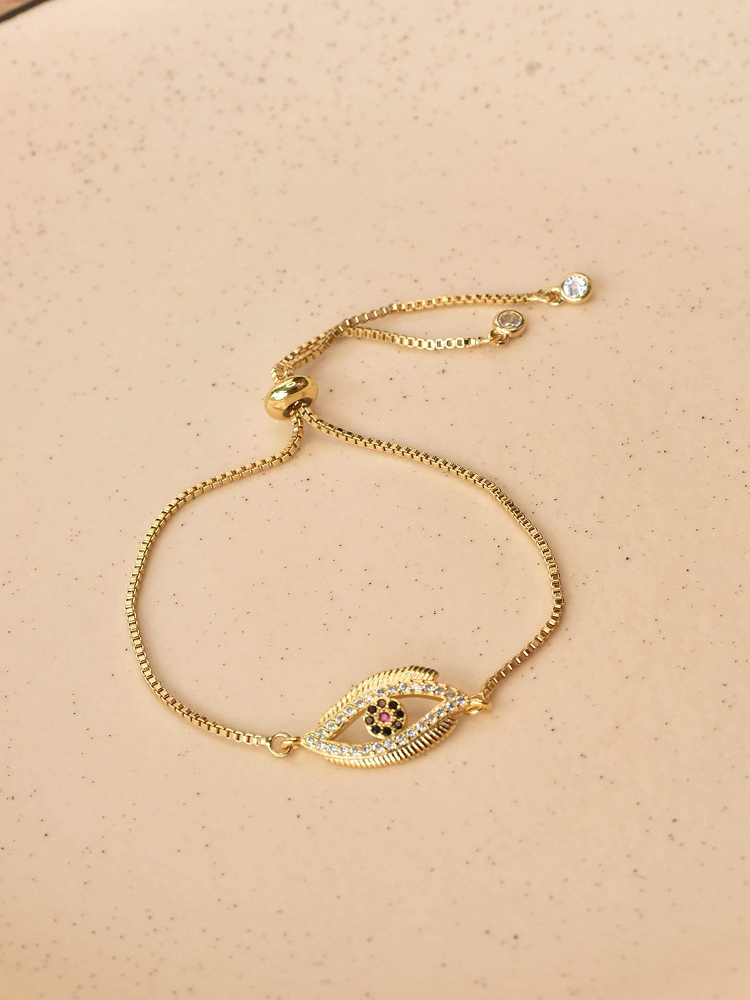 

Klissaa Women Gold-Toned & White Brass Gold-Plated Charm Bracelet