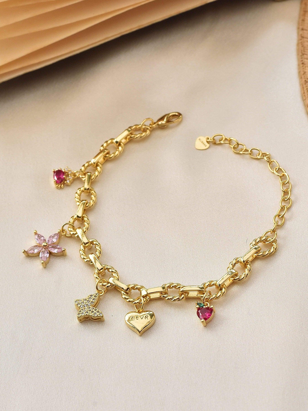 

Klissaa Women Gold-Toned & Pink Brass Gold-Plated Link Bracelet