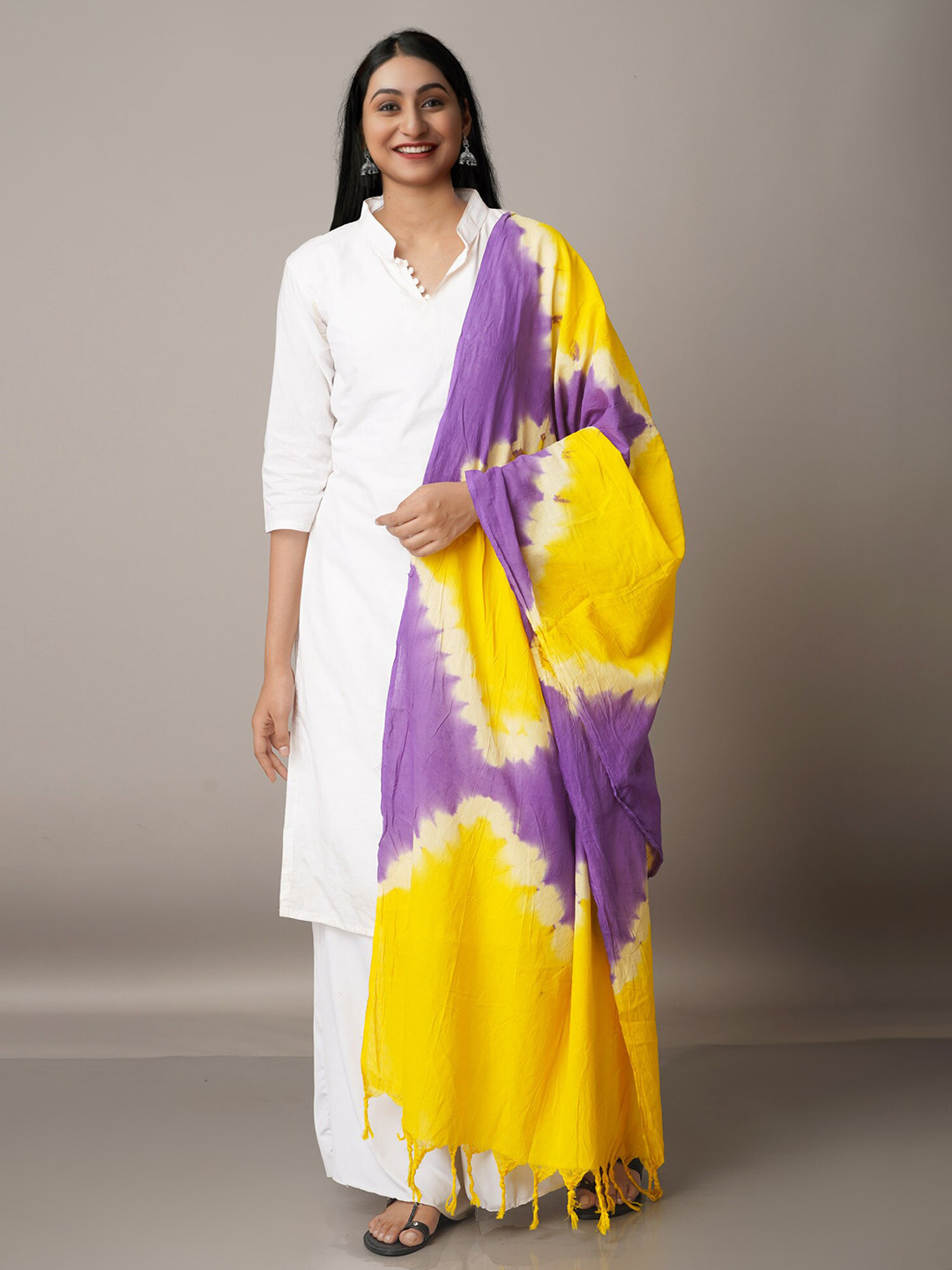 

Unnati Silks Yellow & Purple Printed Pure Cotton Tie and Dye Dupatta