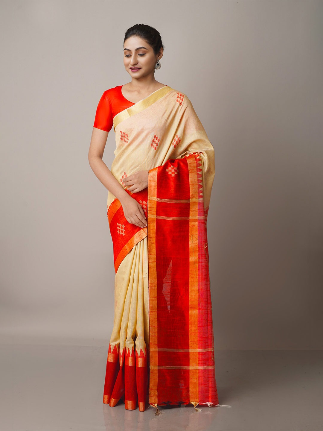 

Unnati Silks Cream-Coloured & Orange Zari Silk Blend Jamdani Saree