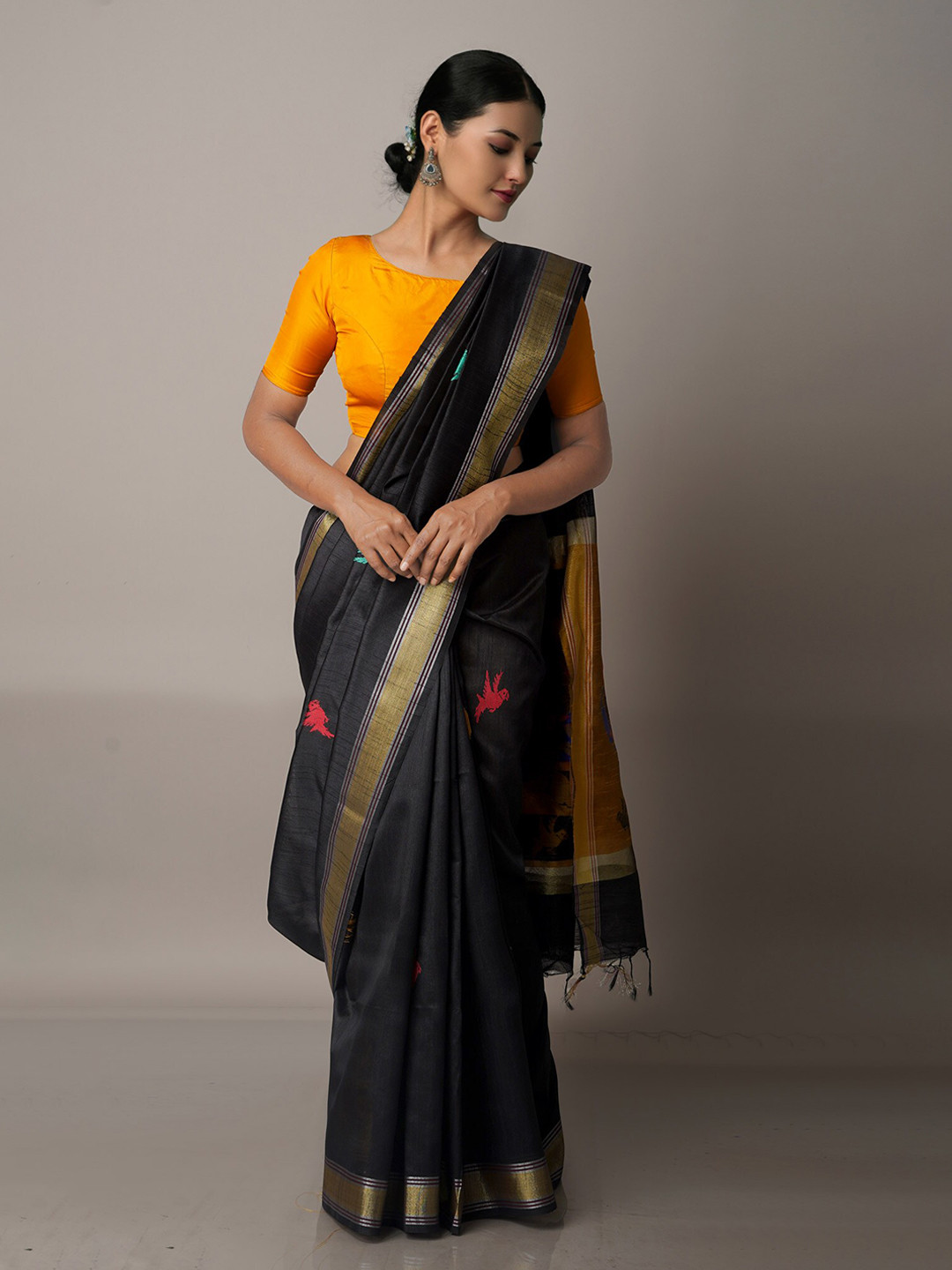 

Unnati Silks Black & Yellow Woven Design Zari Silk Blend Jamdani Saree