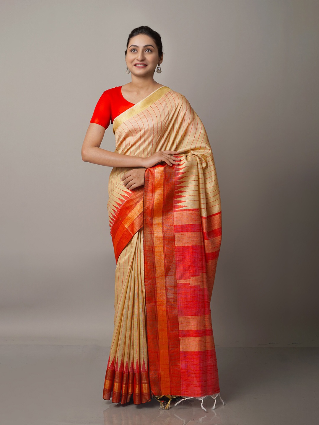 

Unnati Silks Cream-Coloured & Orange Striped Zari Silk Blend Jamdani Saree