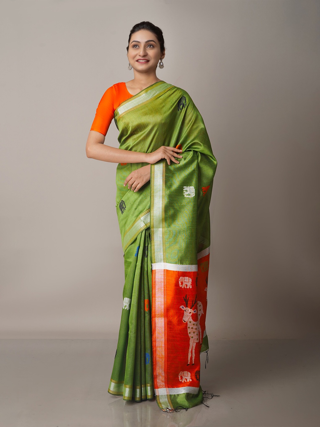 

Unnati Silks Green & Orange Ethnic Motifs Zari Silk Blend Jamdani Saree