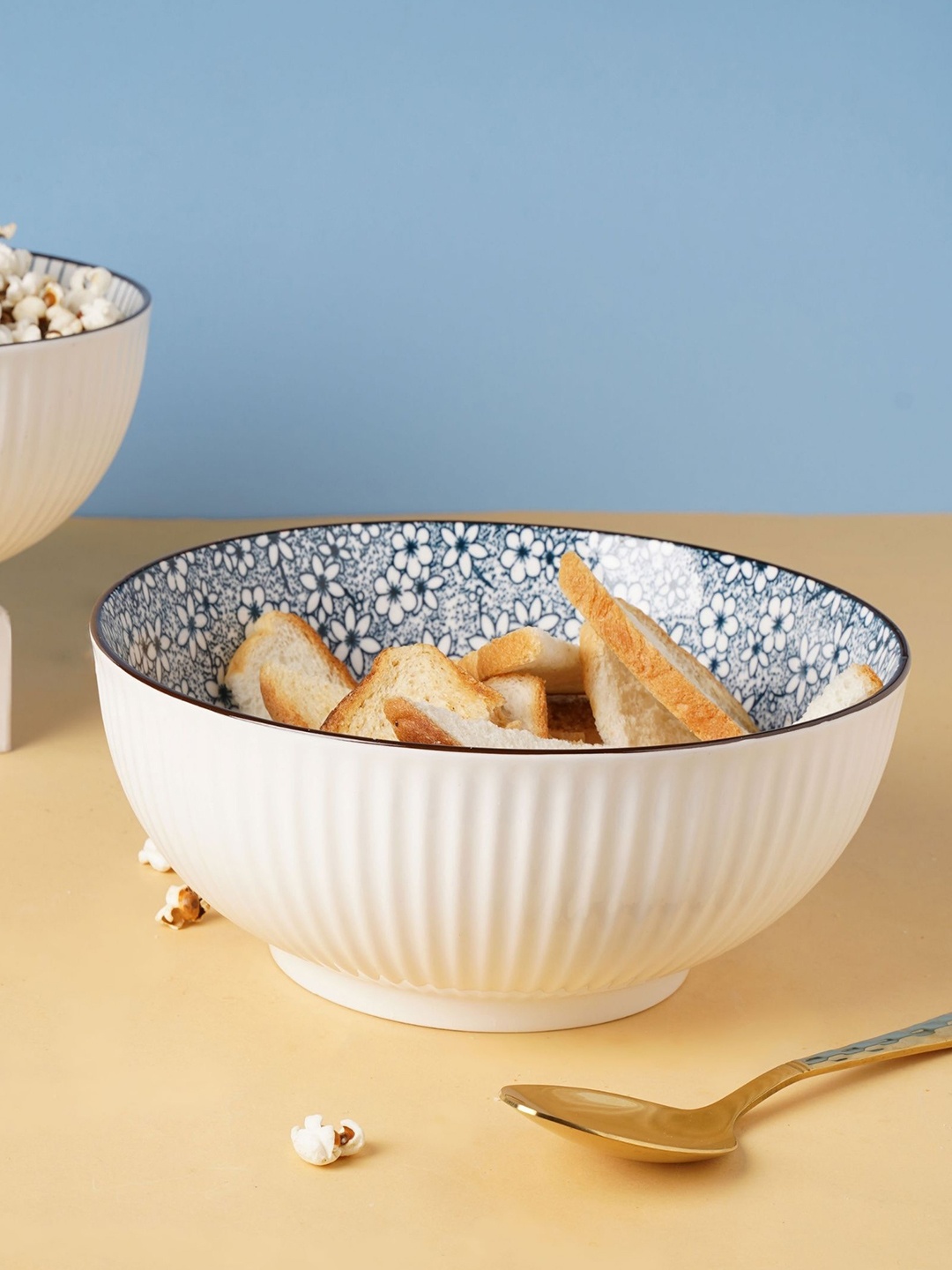 

Nestasia White & Blue Printed Microwave safe Ceramic Glossy Bowl