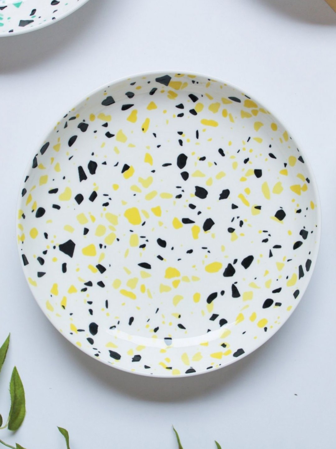 

Nestasia White & Black Printed Microwave safe Ceramic Glossy Plate