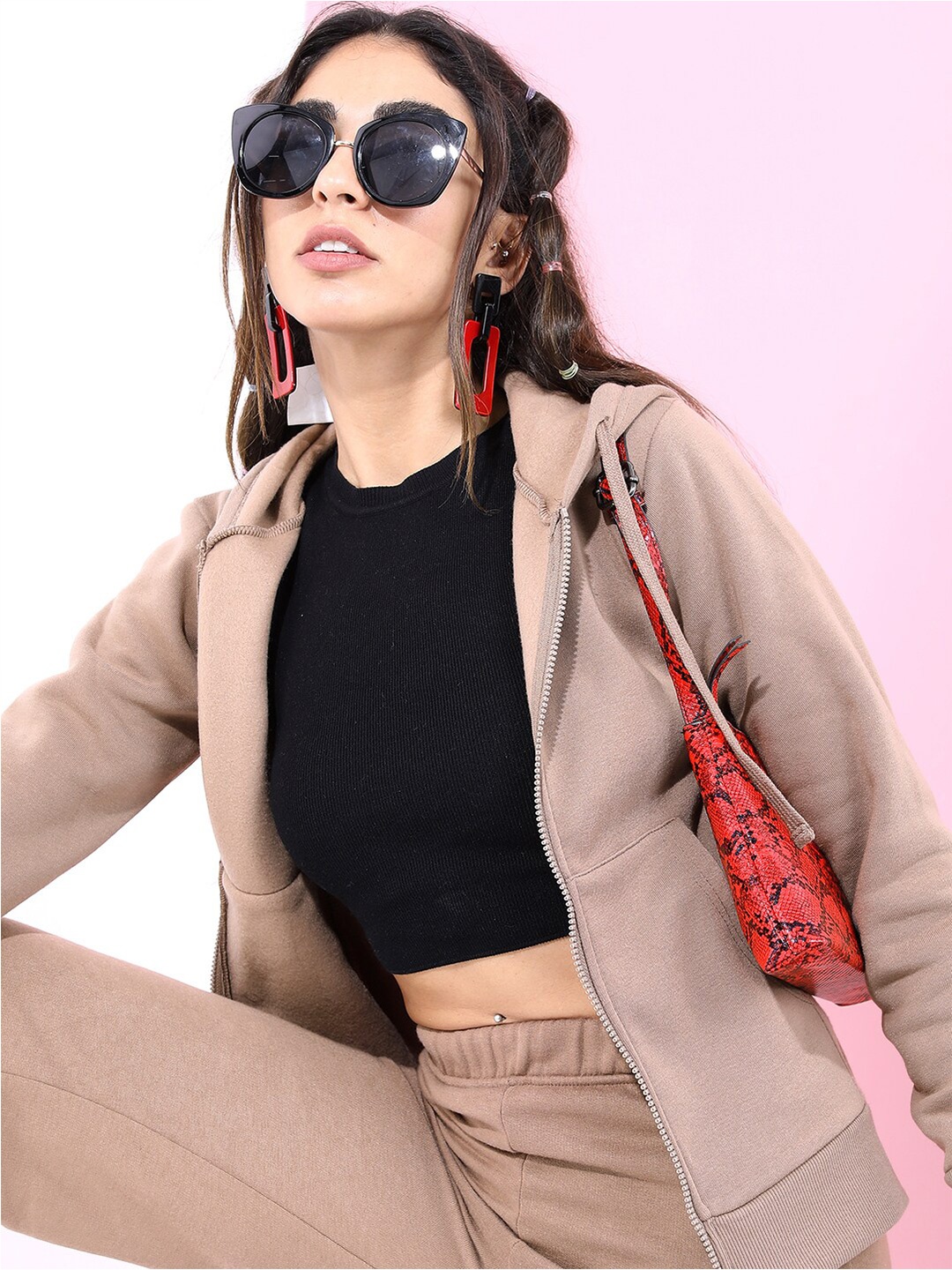 

Tokyo Talkies Women Brown Solid Hooded Sweatshirt